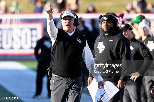 Head coach Gus Malzahn of the UCF Knights reacts to a call in the game against the Duke Blue Devils in the Military Bowl Presented by Peraton at...