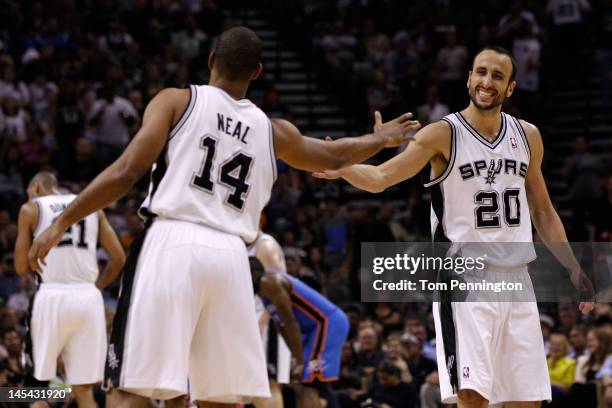 Manu Ginobili and Gary Neal of the San Antonio Spurs celebrate a play in the second half while taking on the Oklahoma City Thunder in Game Two of the...