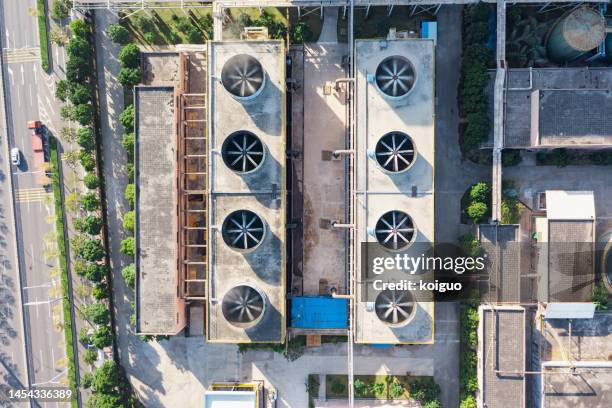 factory roof exhaust fan - cooling tower stock pictures, royalty-free photos & images