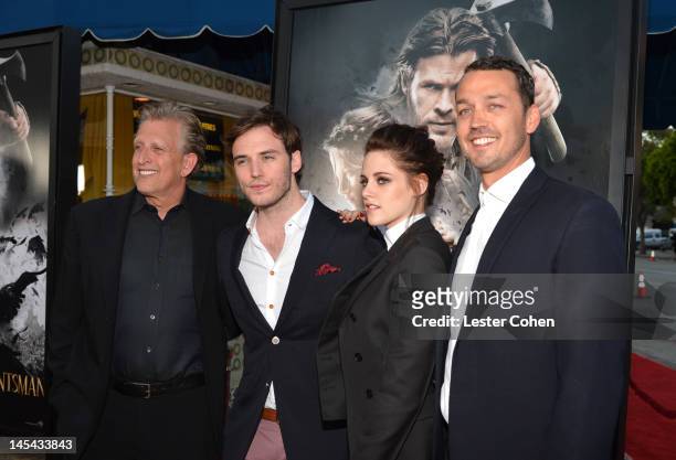 Producer Joe Roth, actor Sam Claflin, actress Kristen Stewart and director Rupert Sanders arrive at the screening of Universal Pictures' "Snow White...
