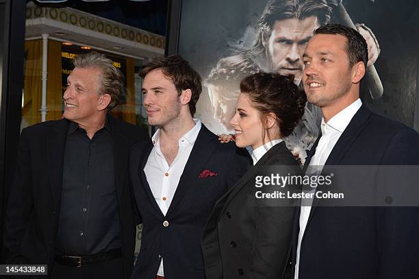 Producer Joe Roth, actor Sam Claflin, actress Kristen Stewart and director Rupert Sanders arrive at the screening of Universal Pictures' "Snow White...