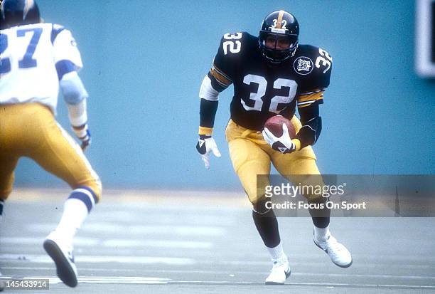 Running back Franco Harris of the Pittsburgh Steelers carries the ball against the San Diego Chargers during the NFL/AFC Wild Card Game January 9,...