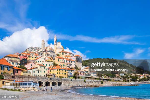 the ancient borough of cervo perched on a hill along the italian riviera - beach club stock pictures, royalty-free photos & images