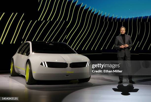 Chairman of the Board of Management of BMW AG Oliver Zipse introduces the BMW i Vision Dee concept EV sport sedan during a keynote address at CES...