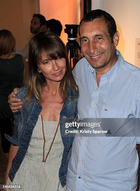 Axelle Laffont and Zinedine Soualem attend the Magnum Cafe opening on May 29, 2012 in Paris, France.