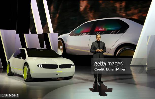Chairman of the Board of Management of BMW AG Oliver Zipse introduces the BMW i Vision Dee concept EV sport sedan during a keynote address at CES...
