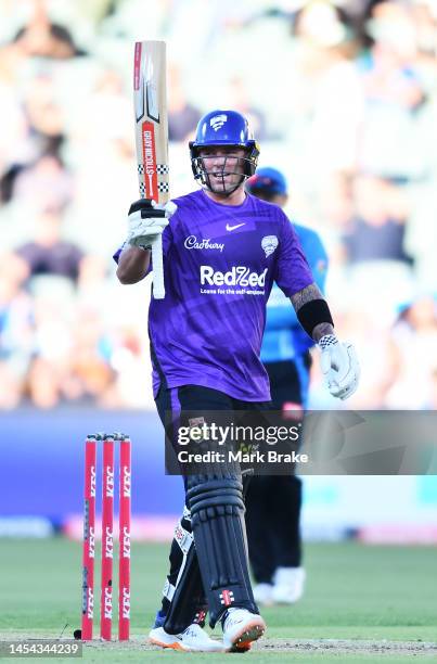 Ben McDermott of the Hurricanes celebrates making his half century during the Men's Big Bash League match between the Adelaide Strikers and the...