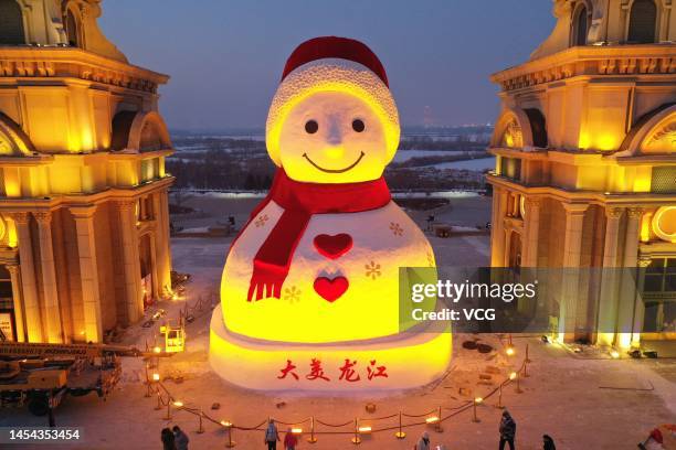 Aerial view of 18-meter-tall snowman being illuminated at Harbin Music Park ahead of Chinese New Year, the Year of the Rabbit, on January 5, 2023 in...