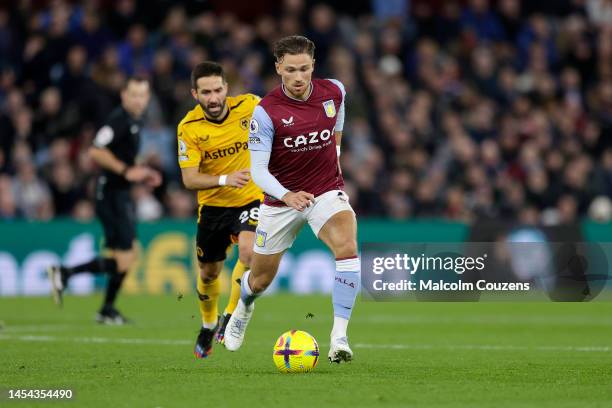 Matty Cash of Aston Villa runs with the ball during the Premier League match between Aston Villa and Wolverhampton Wanderers at Villa Park on January...