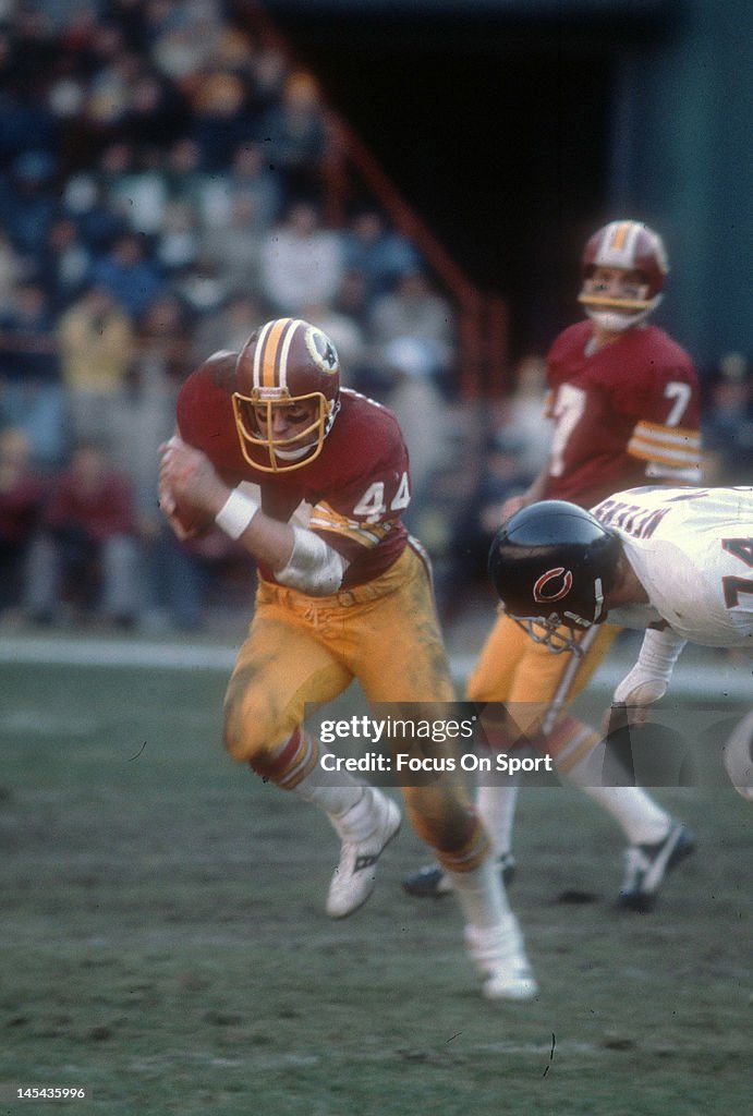 44 Redskins John Riggins Running back John Riggins of the Washington Redskins carries the ball ...