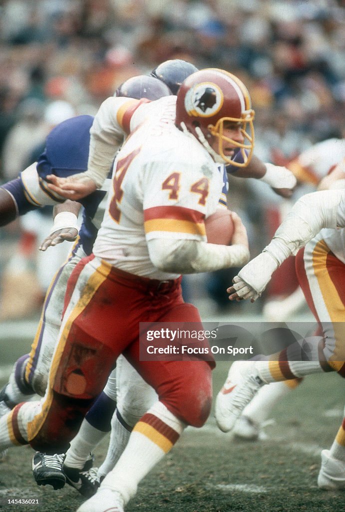 44 Redskins John Riggins Running back John Riggins of the Washington Redskins carries the ball ...