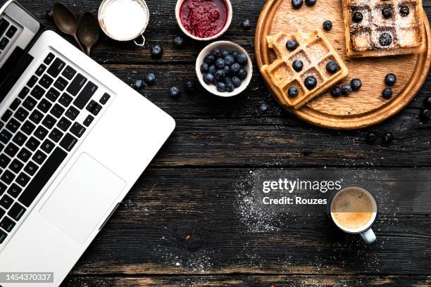 belgian waffles with fruits and powdered sugar - belgium waffles stock pictures, royalty-free photos & images