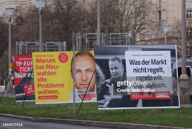 Election campaign posters show German Free Democrats lead candidate Sebastian Czaja and Die Linke lead candidate Klaus Lederer on January 05, 2023 in...