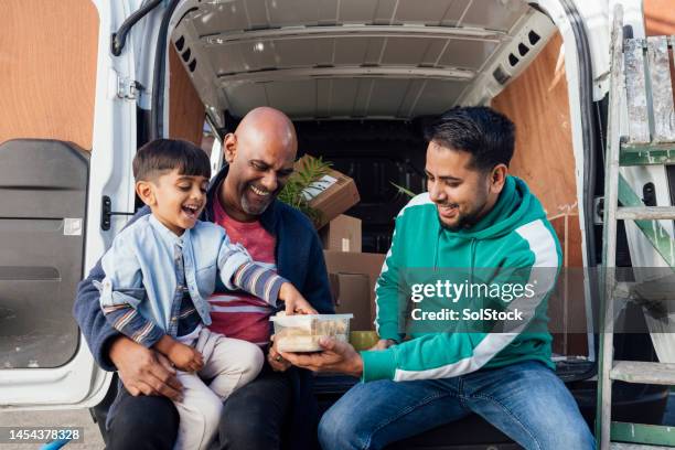 family enjoying spring rolls - spring roll stock pictures, royalty-free photos & images