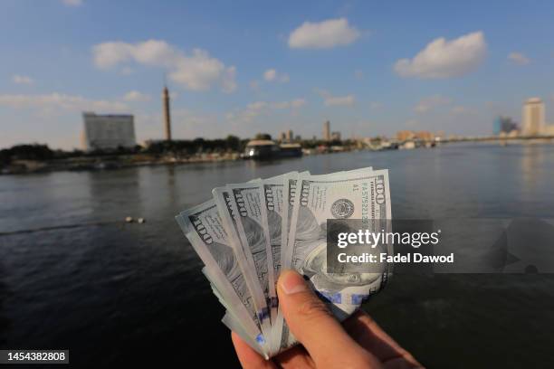General picture of the US dollar on the Nile Corniche on January 5, 2023 in Cairo, Egypt. The Egyptian pound suffered its biggest one-day drop on...