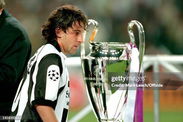 May 1998, Amsterdam - UEFA Champions League Final - Juventus v Real Madrid - Alessandro del Piero of Juventus walks past the trophy.