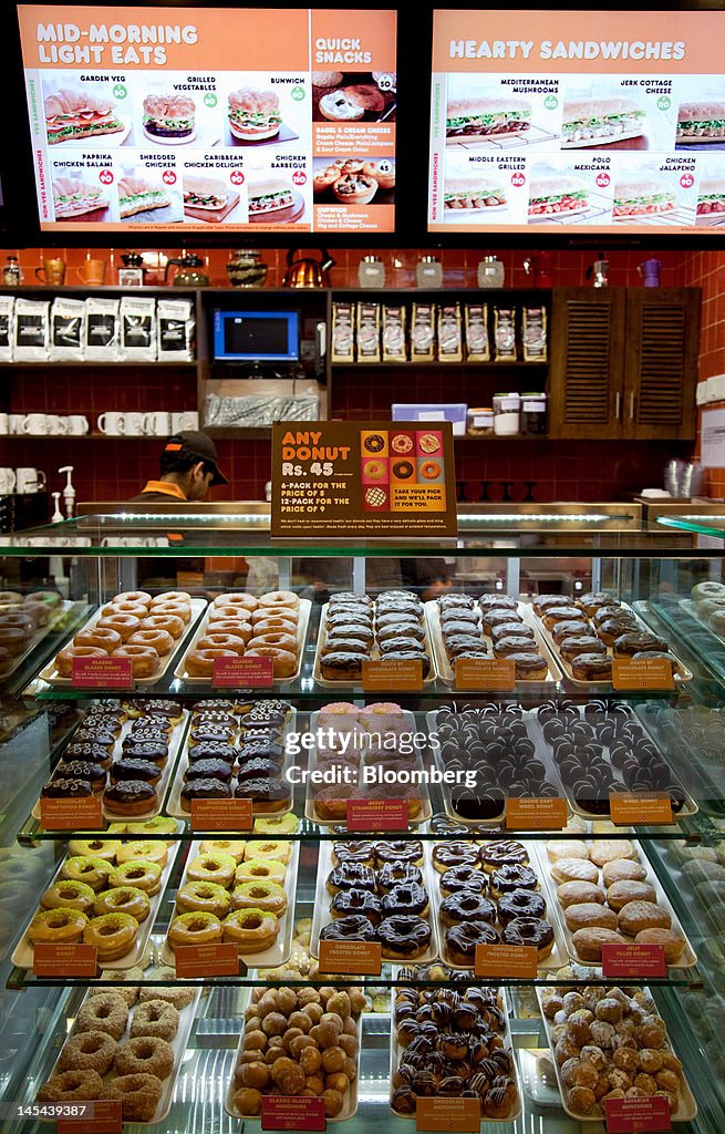 Dunkin Donuts' CEO Nigel Travis At A New Dunkin Donuts' Store