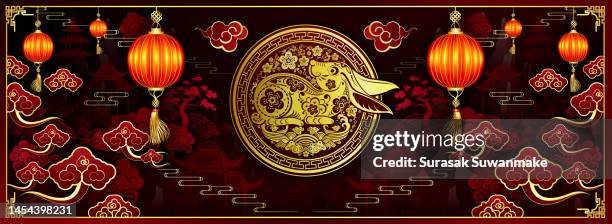 happy chinese new year, this year is the year of the rabbit zodiac, composition with golden paper cuts on red background. (happy new year) - year of the rabbit photos et images de collection