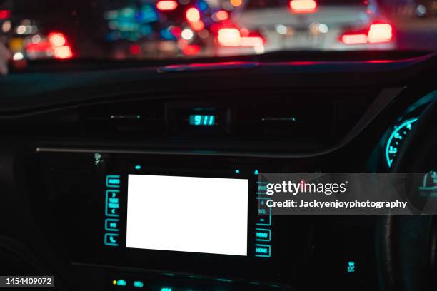 a digital display screen on the dashboard of a modern car - car stereo stock pictures, royalty-free photos & images