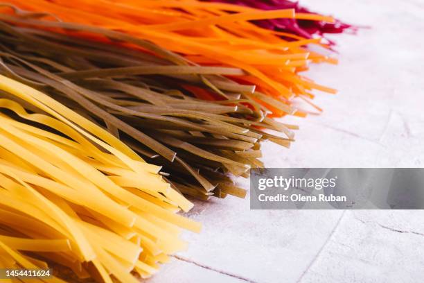 vermicelli of four colorful flowers - vermicelli spiral stock pictures, royalty-free photos & images