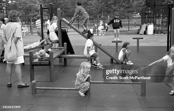 View of children playing at the Juniper Valley Park playground, in Queens' Middle Village neighborhood, New York, New York, August 3, 1997.