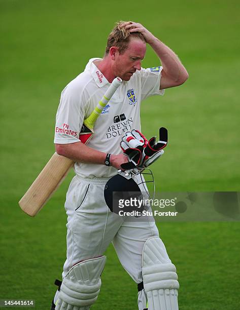 Durham batsman Paul Collingwood leaves the field after being dismissed during day one of the LV County Championship division one match between Durham...
