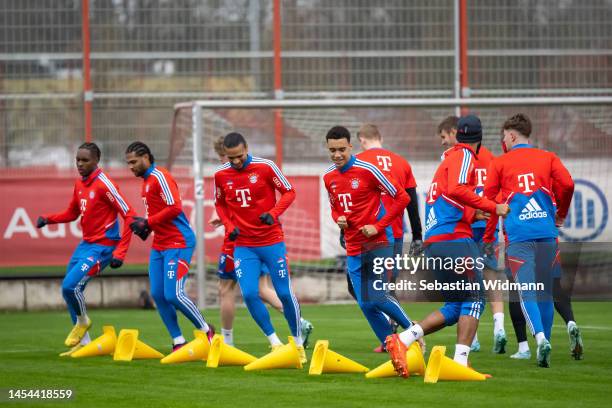 Mathys Henri Tel, Serge Gnabry, Leroy Sane, Jamal Musiala and Eric Maxim Choupo-Moting of FC Bayern München run during a training session at Saebener...