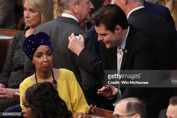 Rep.-elect Matt Gaetz talks to Rep.-elect Ilhan Omar in the House Chamber during the third day of elections for Speaker of the House at the U.S....