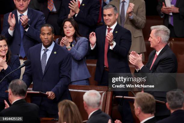 Rep.-elect John James delivers remarks alongside House Republican Leader Kevin McCarthy in the House Chamber during the third day of elections for...