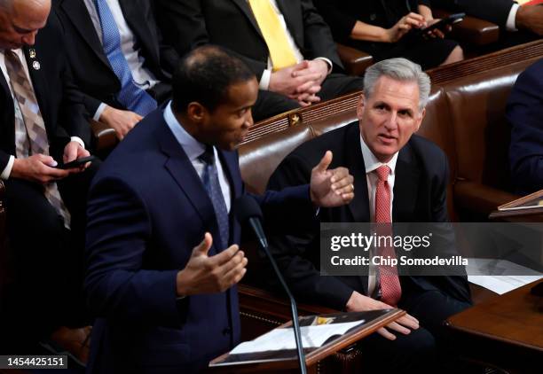 Rep.-elect John James delivers remarks alongside House Republican Leader Kevin McCarthy in the House Chamber during the third day of elections for...