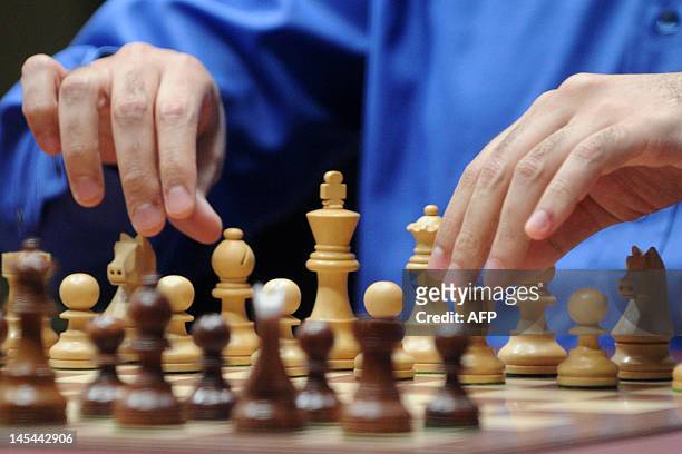 India's Vishwanathan Anand plays against Israel's Boris Gelfand during a tie-break of FIDE World chess championship match in State Tretyakovsky...