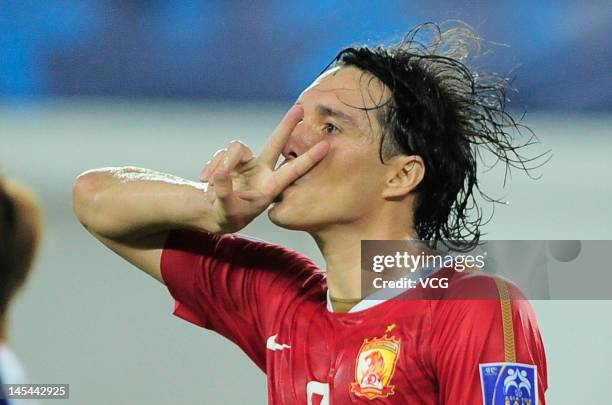 Cleverson Cordova Cleo of Guangzhou Evergrande celebrates after scoring his team's first goal during the AFC Champions League eighth-final match...