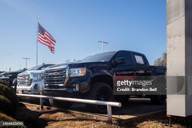 Pickup trucks are displayed for sale on a lot at a General Motors dealership on January 05, 2023 in Austin, Texas. General Motors has reclaimed its...