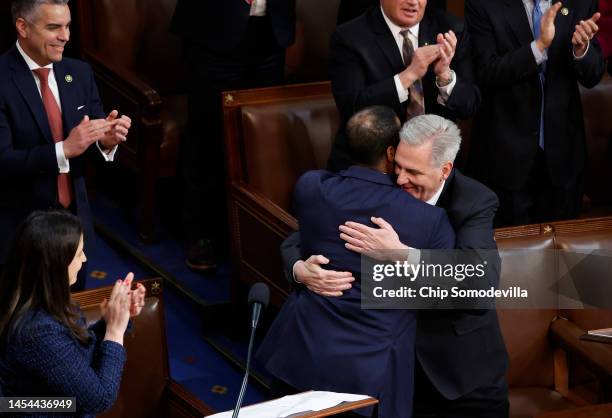 House Republican Leader Kevin McCarthy hugs Rep.-elect John James in the House Chamber during the third day of elections for Speaker of the House at...