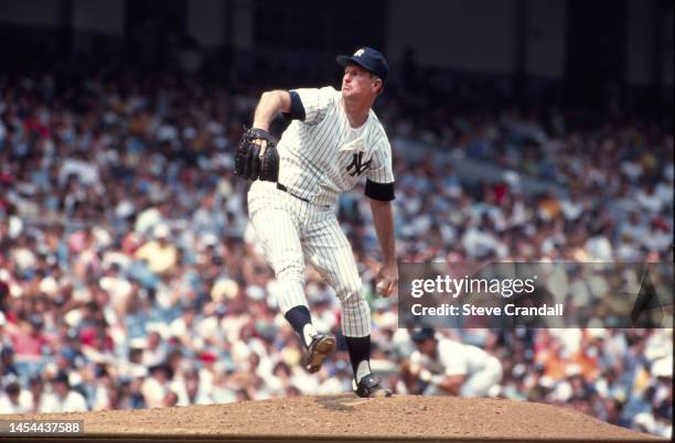 Yankees pitcher Tommy John delivering a pitch vs the Kansas City Royals during a game at Yankee Stadium on July 9, 1988 in New York, United States.