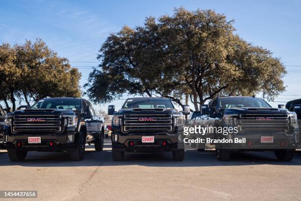 Pickup trucks are displayed for sale on a lot at a General Motors dealership on January 05, 2023 in Austin, Texas. General Motors has reclaimed its...