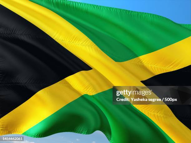 full frame shot of wavy indian flag,jamaica - jamaica stock pictures, royalty-free photos & images