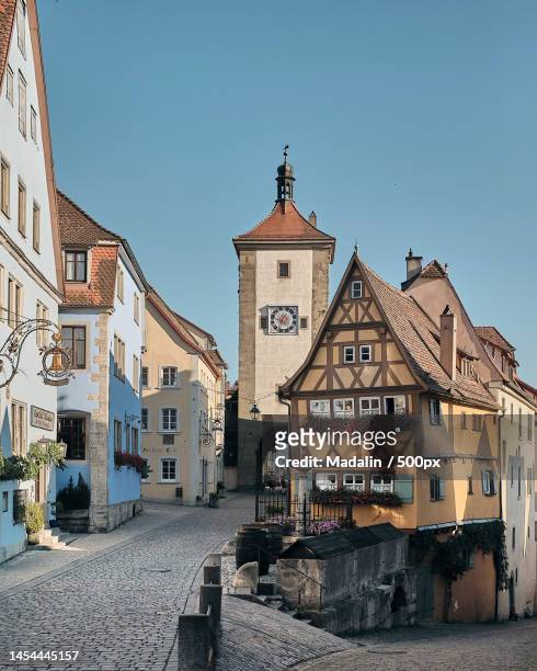 view of buildings in city against clear sky,rothenburg ob der tauber,germany - rothenburg stock pictures, royalty-free photos & images