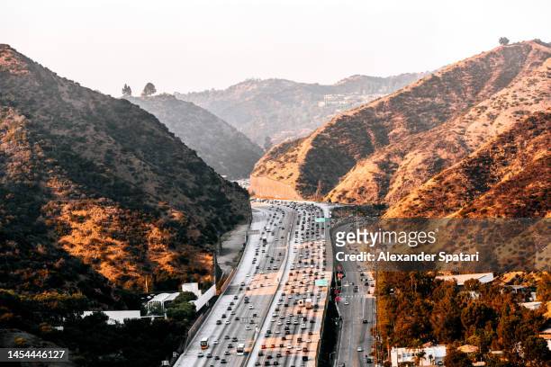 highway 405 and surrounding hills in los angeles, california - hollywood hills los angeles stock pictures, royalty-free photos & images