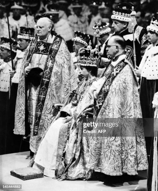 Queen Elizabeth II, surrounded by the bishop of Durham Lord Michael Ramsay and the bishop of Bath and Wells Lord Harold Bradfield, receives homage...