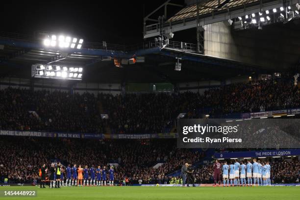 General view of players of Chelsea and Manchester City during a minutes applause in memory of former Brazil player Pele prior to the Premier League...