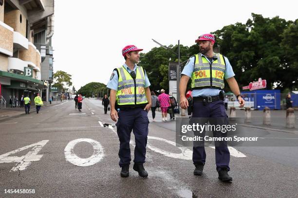 Police officers wear pink hats for Jane McGrath Day during day three of the Second Test match in the series between Australia and South Africa at...