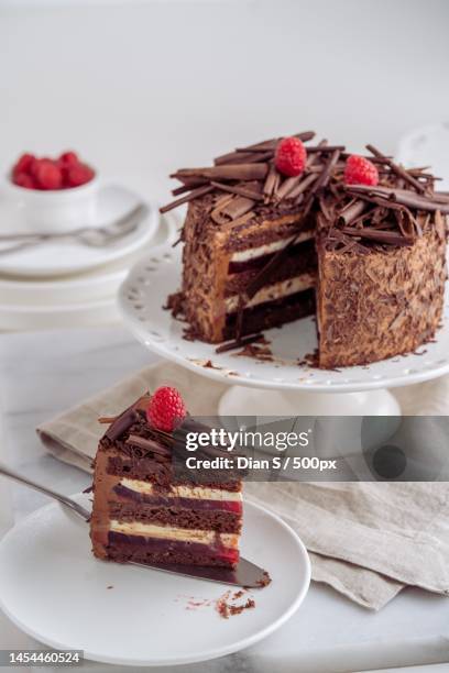 close-up of cake in plate on table - black forest gateau stock-fotos und bilder