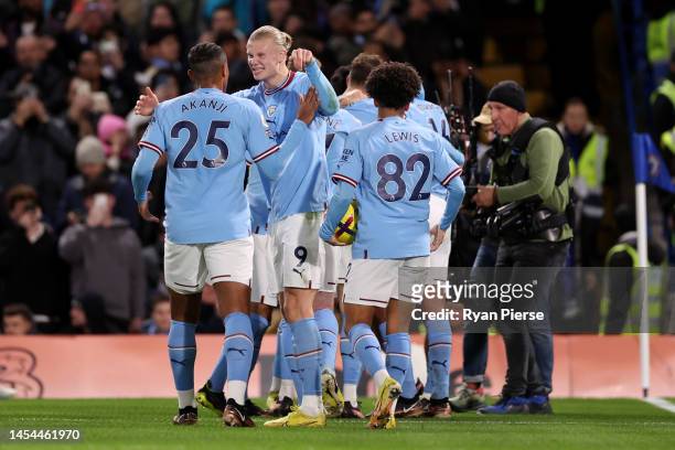 Players of Manchester City celebrate after Riyad Mahrez of Manchester City scores the team's first goal during the Premier League match between...