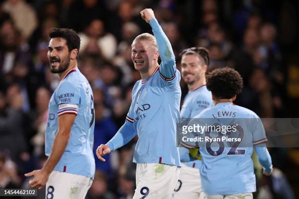 Erling Haaland of Manchester City celebrates after Riyad Mahrez scores the team's first goal during the Premier League match between Chelsea FC and...