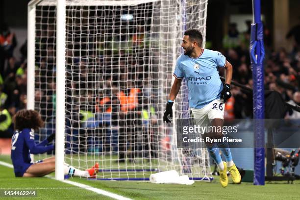 Riyad Mahrez of Manchester City celebrates after scoring the team's first goal during the Premier League match between Chelsea FC and Manchester City...