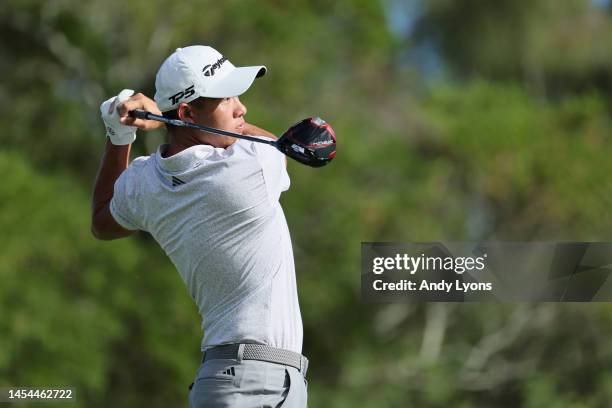 Collin Morikawa of the United States plays his shot from the fourth tee during the first round of the Sentry Tournament of Champions at Plantation...