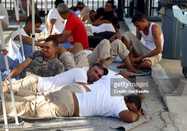 Migrants from Cuba wait to be processed at the U.S. Customs and Border Protection Marathon Border Patrol Station on January 05, 2023 in Marathon,...