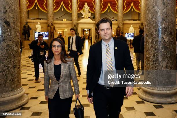 Rep.-elect Lauren Boebert and Rep.-elect Matt Gaetz walk to the House Chamber during the third day of elections for Speaker of the House at the U.S....