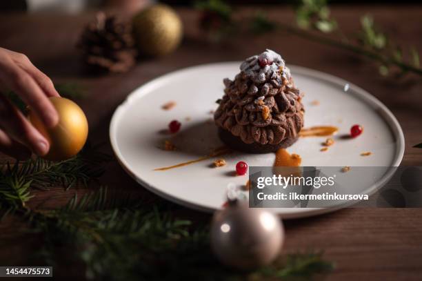 a plate of pine tree-like chestnut tart - treelike stock pictures, royalty-free photos & images